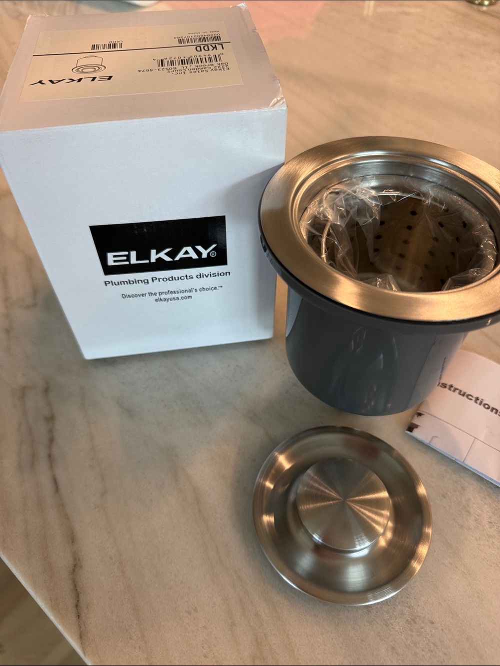 NWT Elkay 3 1/2 inch basket strainer and stopper drain.